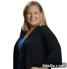 Cyndi Cook, Director of Marketing at RE/MAX DFW Associates, instrumental in agent support and development.