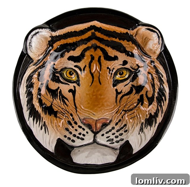 Black ceramic bowl with embossed tiger face design