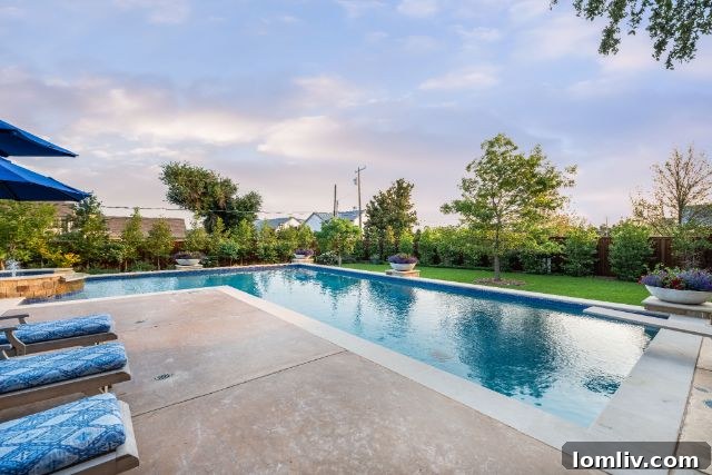 Bespoke Mediterranean Grandeur in Lobello Estates 13 Inviting Patio with Outdoor Fireplace