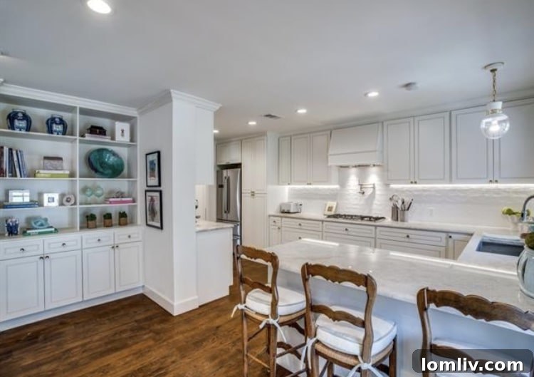 Upscale Open Houses: Your Dream Home Awaits This Weekend 12 Modern kitchen with quartzite counters and Bosch appliances in a Kessler Ranch home