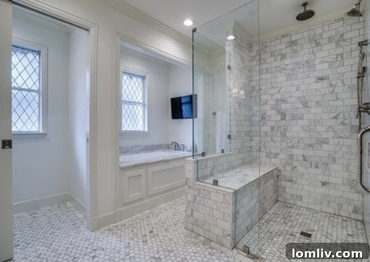 Upscale Open Houses: Your Dream Home Awaits This Weekend 13 Living area with a double-sided fireplace and elegant Taj-Mahal quartzite accents