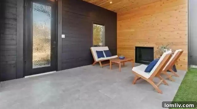 Close-up view of the exterior front of 8631 Daytonia Avenue, showing part of the private courtyard