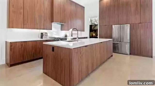 Modern kitchen with wooden cabinets and natural stone countertops