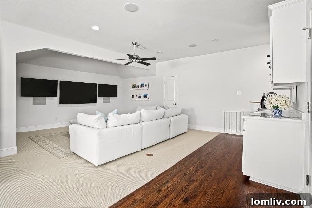 Dedicated Media Room with Multiple Screens and Wet Bar