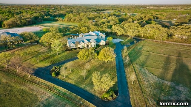 480HouseA - Front view of the luxury equestrian estate in Bartonville, Texas