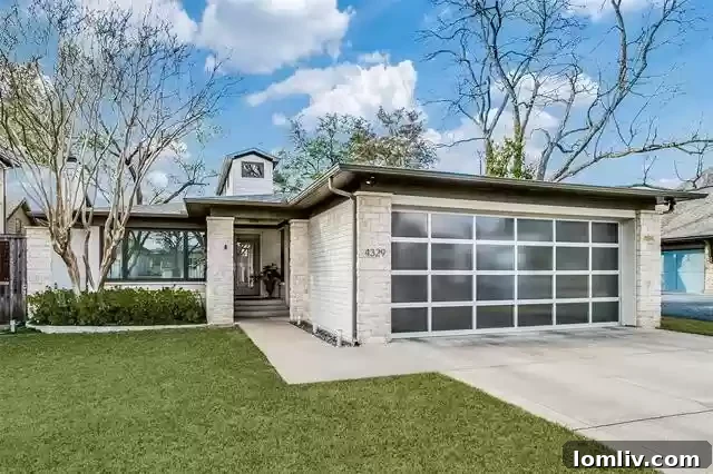 Bluffview Estates home exterior with modern garage door