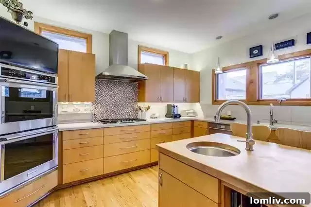 Open concept living and dining area leading to outdoor patio