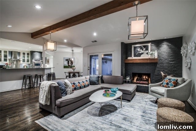 Expansive backyard with lush green lawn, offering ample space for outdoor activities and potential for a pool