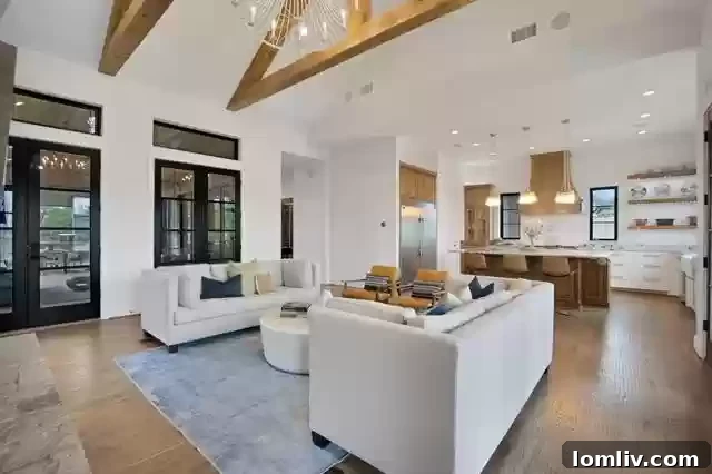 Farmhouse Chic with a City Twist The Ultimate Rural Retreat 6 Gourmet kitchen with a large island and high-end appliances