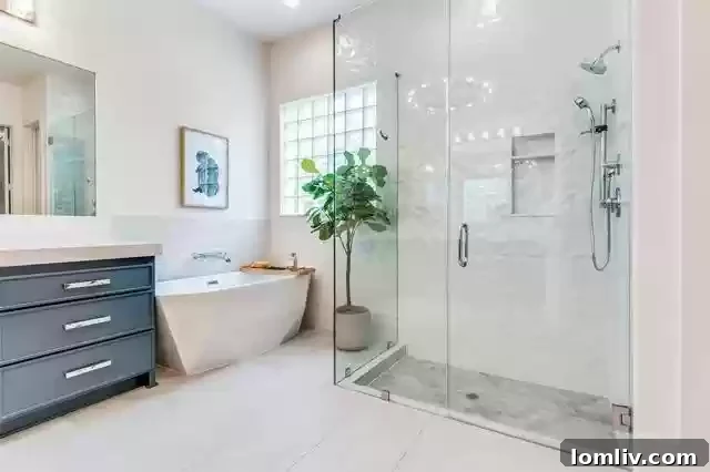 Inviting bedroom with ample space, soft lighting, and modern design, offering a peaceful retreat