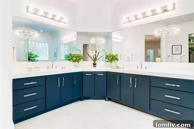Beautifully updated bathroom with contemporary fixtures, a spacious walk-in shower, and clean design