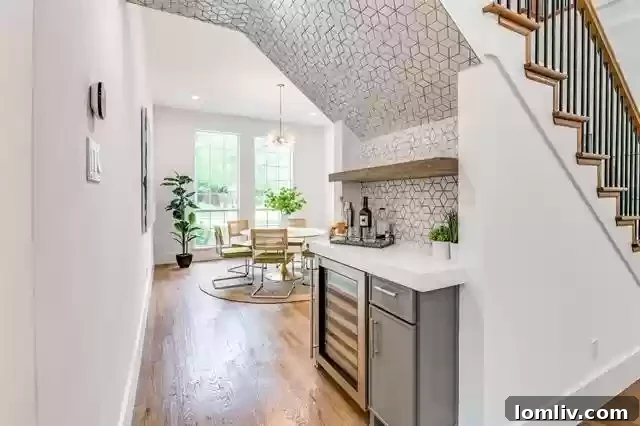 A chic and functional home office with elegant built-in shelving, ample natural light, and modern furnishings