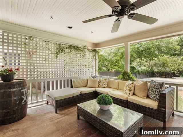 Renovated bathroom featuring subway tile and vintage-look pedestal sink
