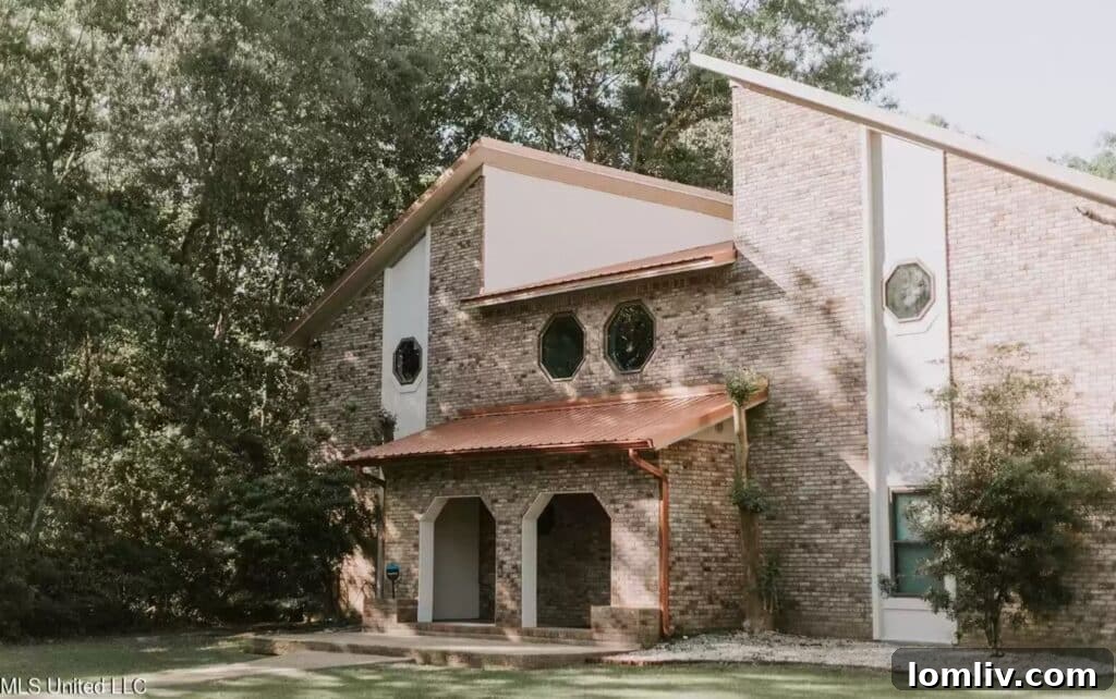 Discover a home where geometry meets the unexpected, featuring a unique mannequin collection in Gautier, Mississippi.