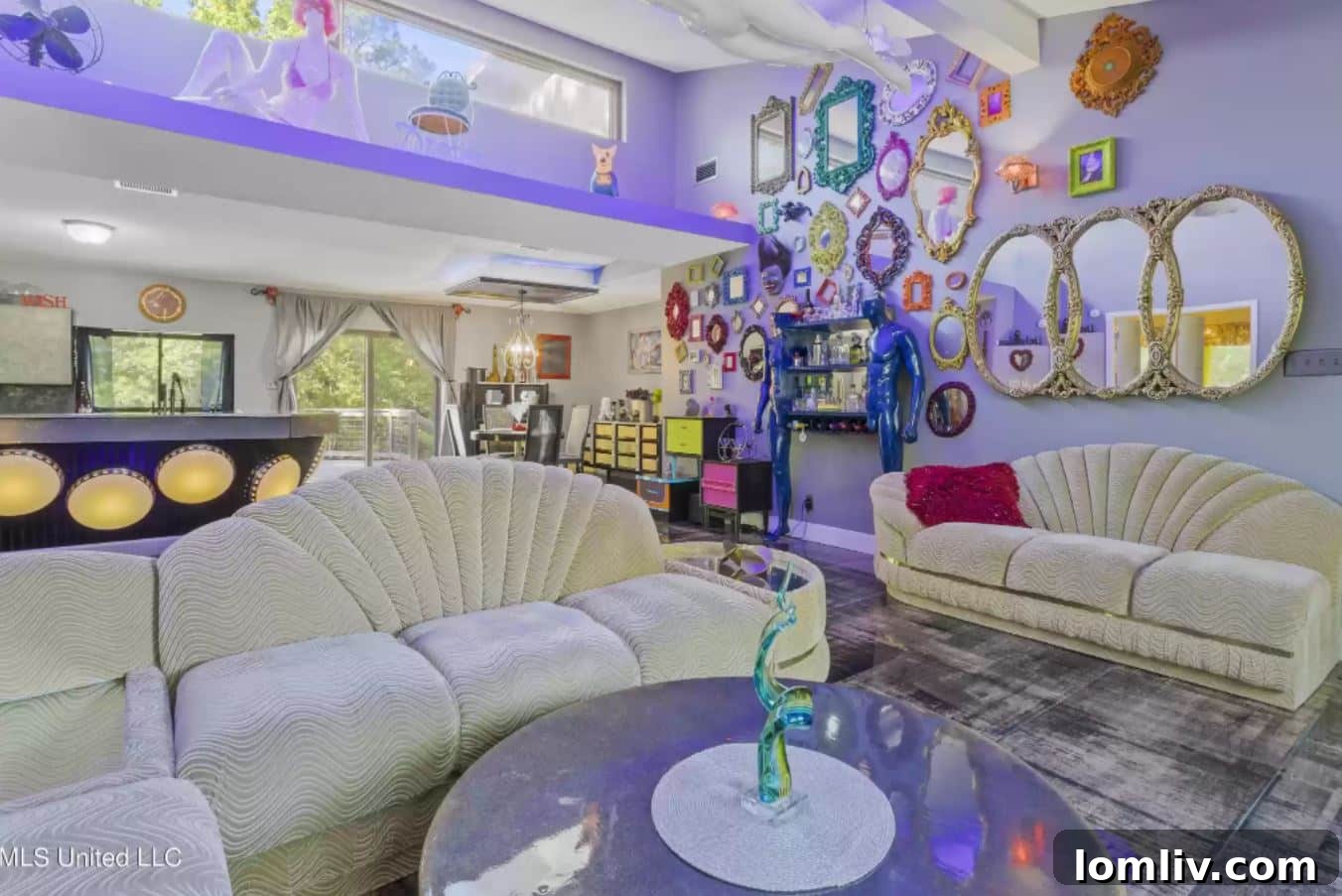 Intriguing display of mannequins and abstract forms supporting a shelf in the unique Mississippi home.