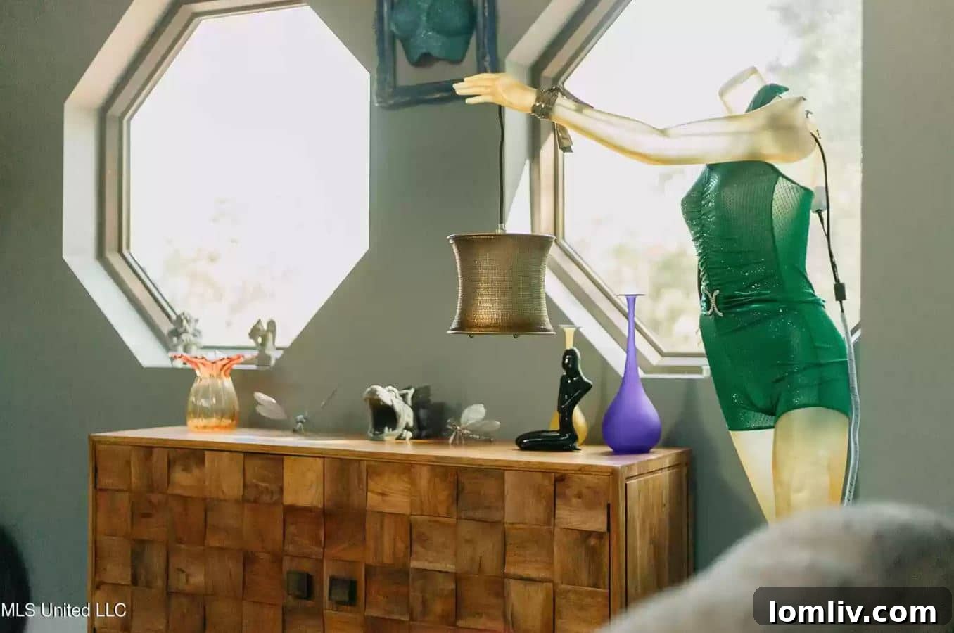 A striking headless mannequin display, featuring prominent details, within the unique Gautier home.