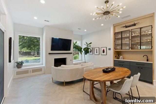 Suburban Southlake, Surprisingly Stylish 13 Elegant master bedroom seating area with ample natural light