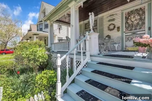 Elaborate Wreath on a Dark Front Door of a Victorian House
