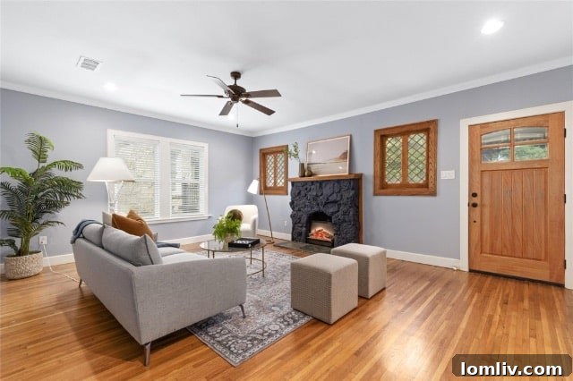 Charming entryway of the Tudor home, highlighting architectural details and a warm, inviting atmosphere with natural light