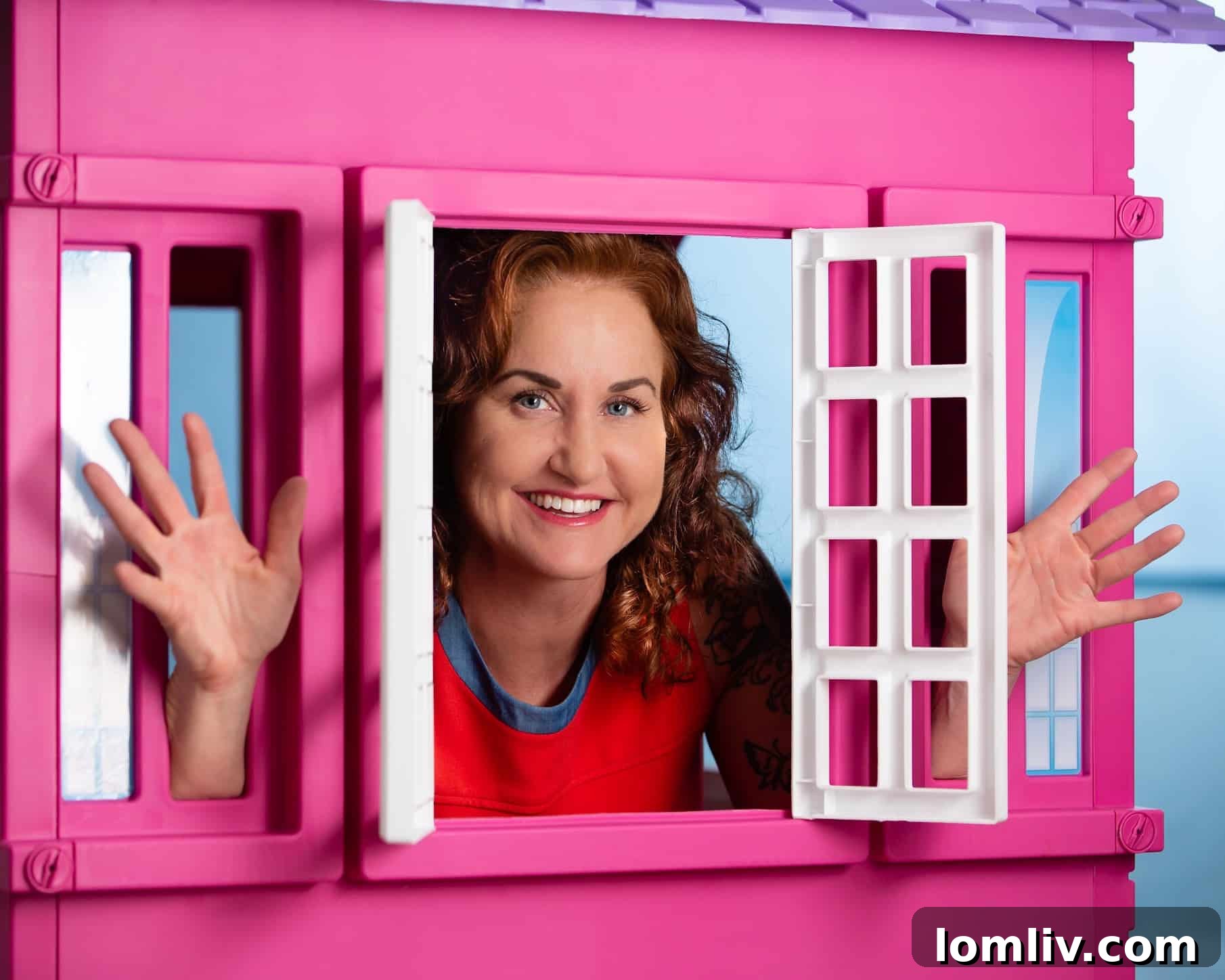 Toni Youngblood, a unique Dallas-Fort Worth Realtor known for her vibrant pink bob haircut and distinctive tattoos, breaking traditional real estate molds.