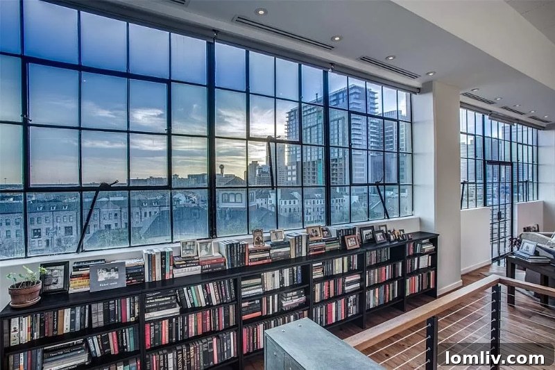 Bedroom with city views in Dallas loft