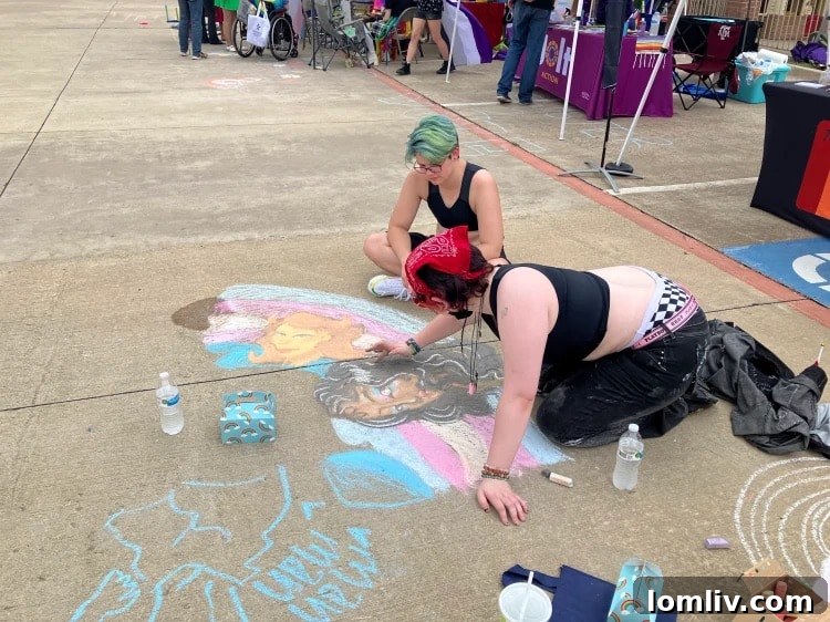 Hundreds gather for a vibrant Pride event hosted by Texas Pride Realty Group, promoting community and acceptance.