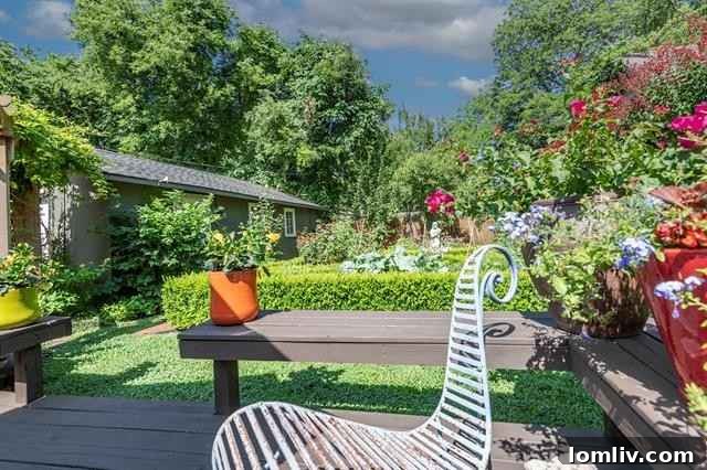 Exquisite sculpted boxwood garden in the backyard of a Fairmount historic home, designed with a complex maze pattern