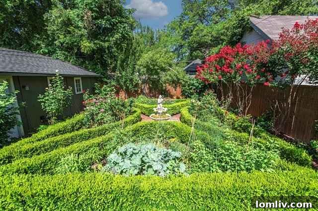 Private backyard oasis with vibrant rose bushes and crepe myrtles along the fence in Fort Worth