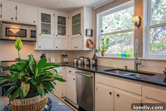 Bright and spacious kitchen with original cabinetry, ready for a modern touch and tactical upgrades