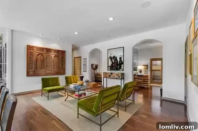 An Extraordinary Home: Elegance Crafted for the Discerning Spirit 7 Elegant dining space within the open-concept design of 3610 Congress, perfect for entertaining.