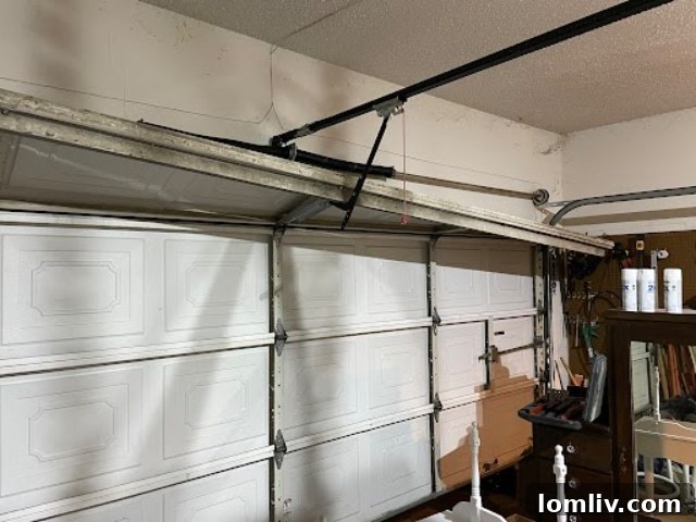 Garage door off its track, illustrating a common home inspection issue