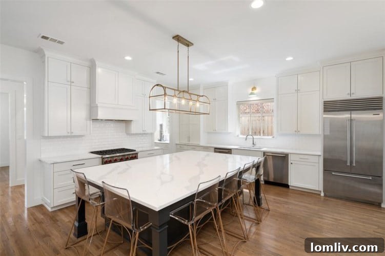 Modern Kitchen with Stainless Steel Appliances and Sub-Zero Refrigerator