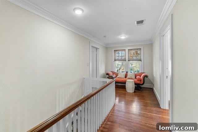 Versatile flex space with celery green walls and hidden television cabinets