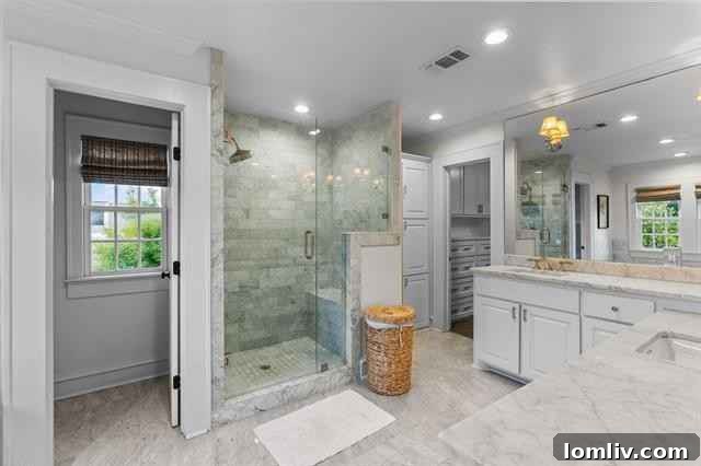 Luxurious primary suite with sitting area and fireplace