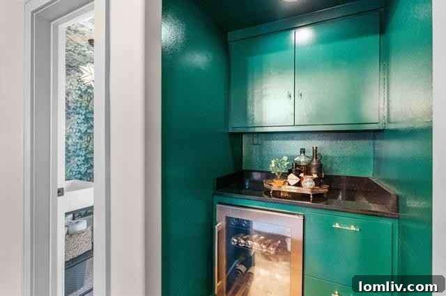 Modern eat-in kitchen with professional gas range and Carrara marble countertops