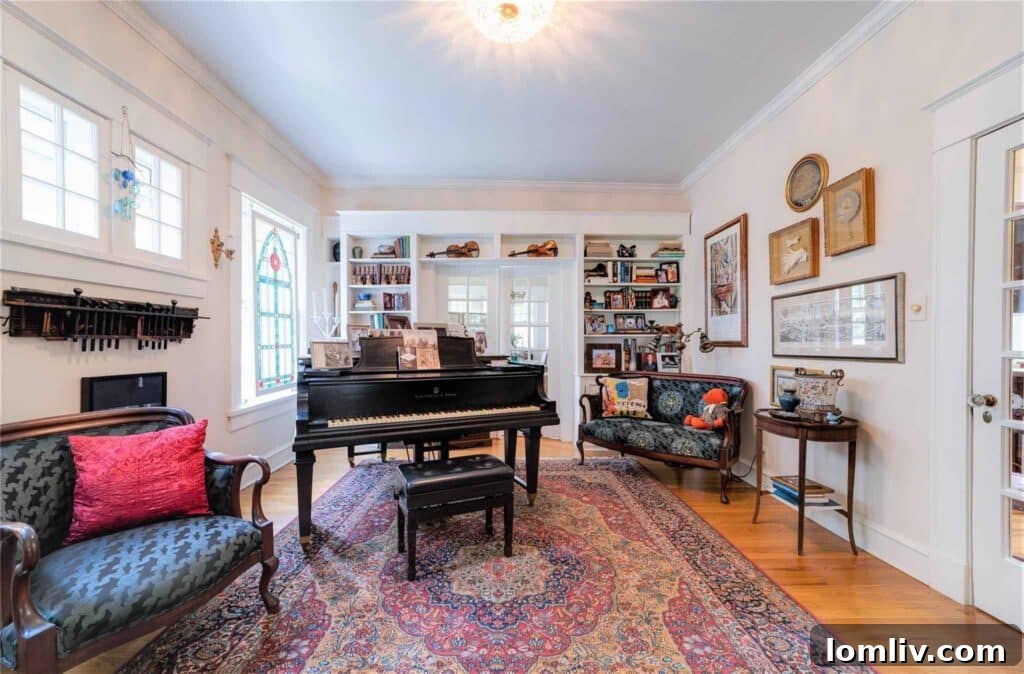 Cozy seating area, possibly a converted sleeping porch, in the historic Ryan Place residence