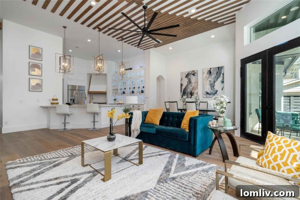 Open concept living area with high ceilings and modern finishes at 100 Lindenwood Drive