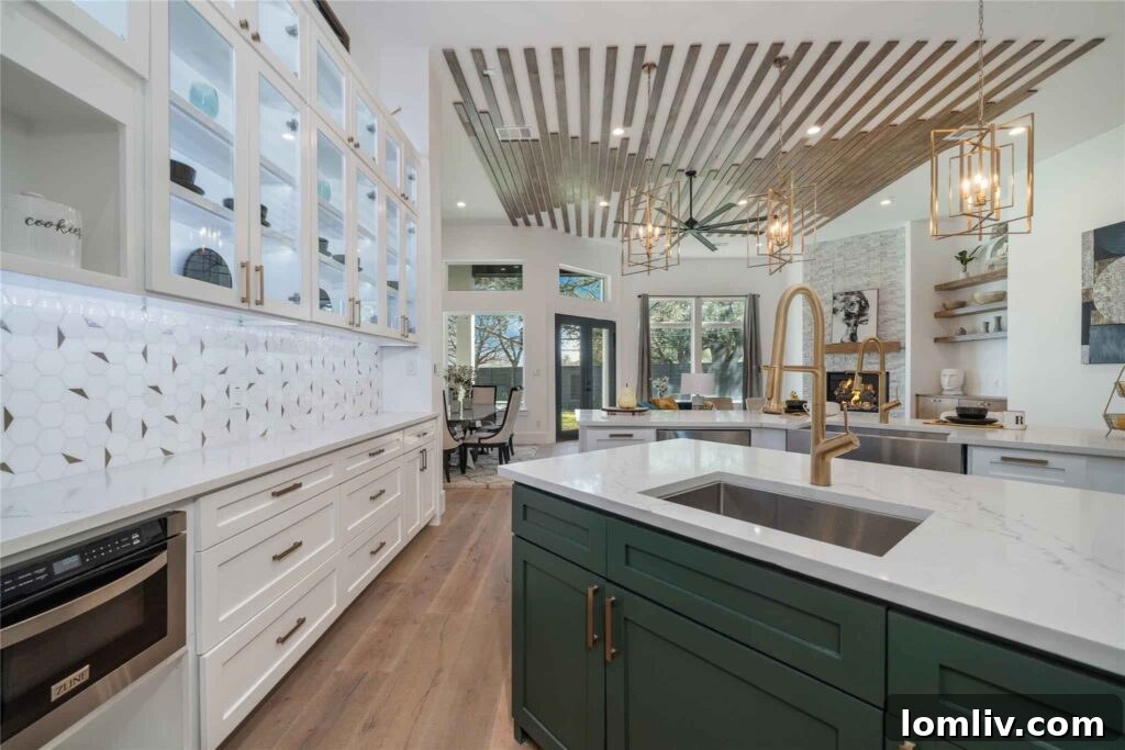 Modern kitchen with high-end cabinetry and stylish backsplash in Westside Fort Worth home