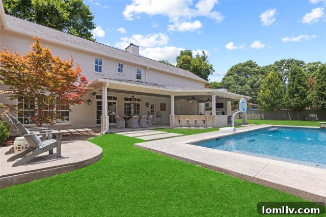 Timeless Grandeur of White Rock Valley 21 Inviting Covered Patio with Outdoor Kitchen