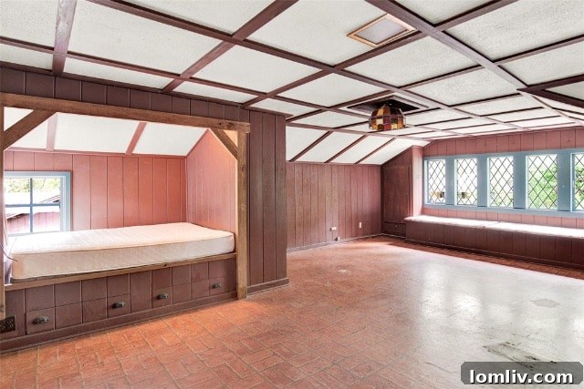 Warm and inviting living room in the Garland home, featuring a charming fireplace with decorative mantel and comfortable seating