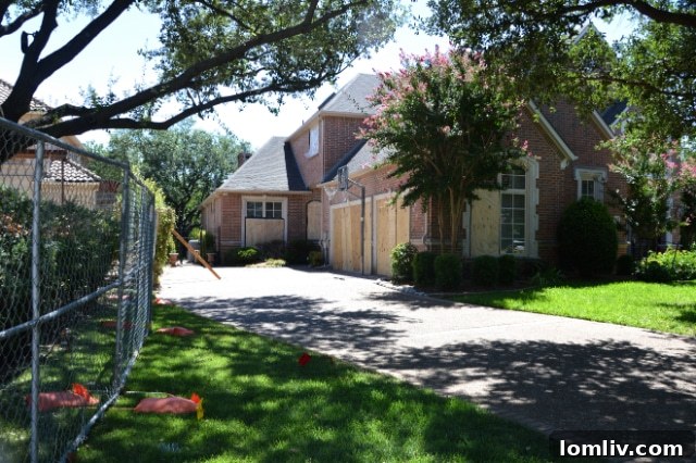 Side view of the Plano home showing further structural compromise after the explosion