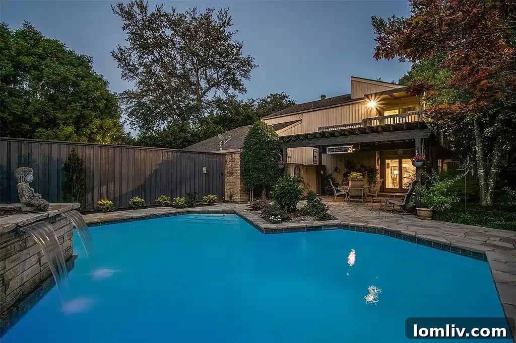 Charming balcony overlooking the pool and backyard