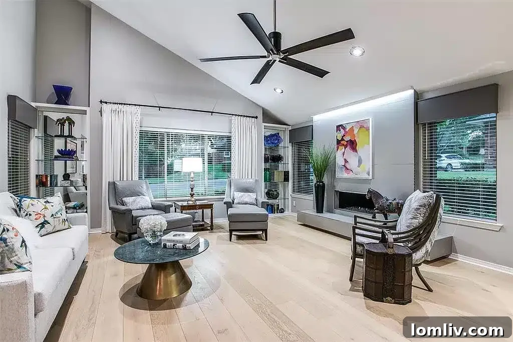 Elegant living room with high ceilings and fireplace in Lakewood home