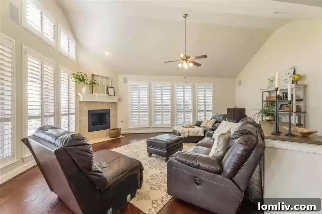Dining area adjacent to the kitchen, featuring abundant natural light