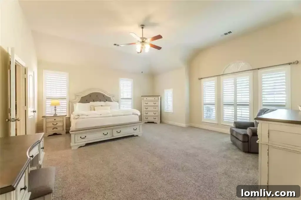 Upstairs game room configured as a media room with a projector, offering entertainment for all ages