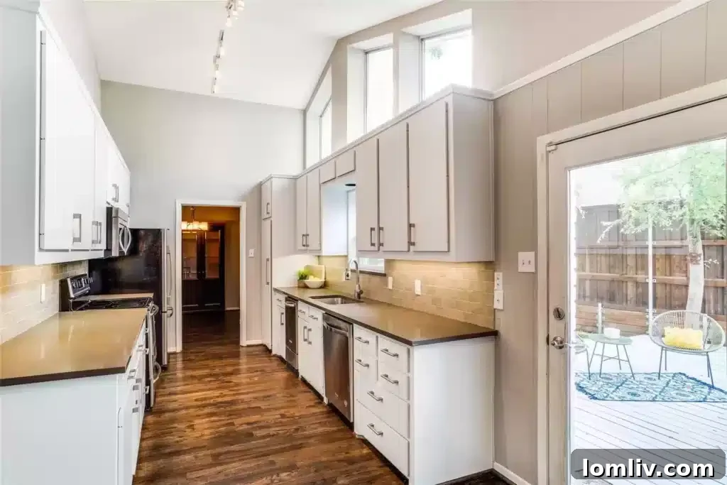 White Rock Elementary: A Galactic Home for Growing Minds 6 An inviting kitchen area, showcasing modern appliances and ample counter space.