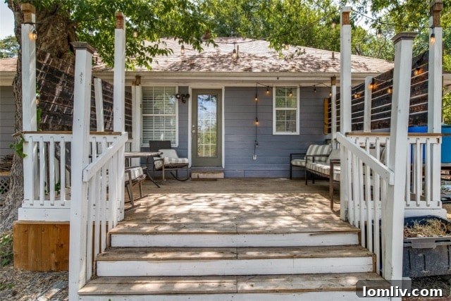 Side view of the charming rustic home on the property
