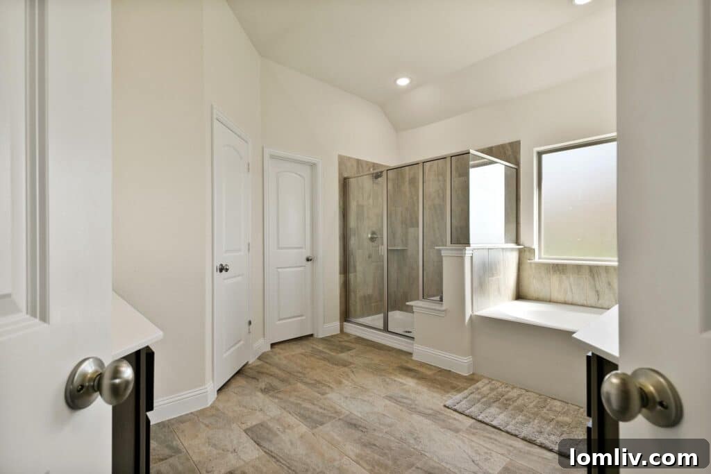 Spa-like master bathroom with circular soaking tub