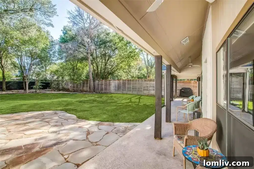 Spacious Backyard with Lush Greenery and Room for Pool