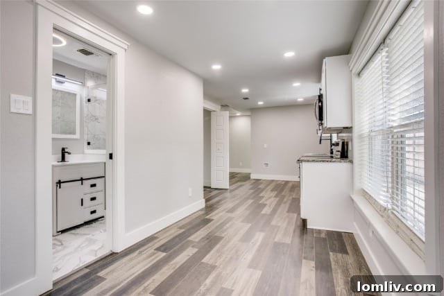 Welcoming facade of the modernly renovated duplex in Oak Cliff